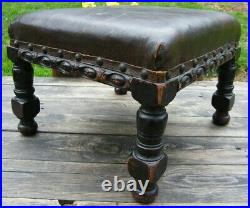 A Pair Of Carved Wood & Faux Leather Country House Foot Stools