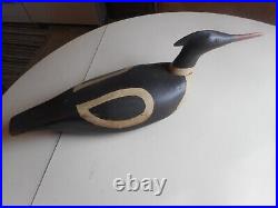A pair of early 20th Century hand carved and painted Merganser Decoys. Decoy