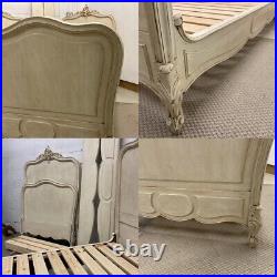 Matched pair of Vintage French single beds carved painted