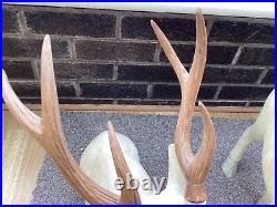 PAIR OF LARGE WOODEN DEER one standing and one sitting