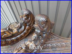 PAIR antique wood carved angel dolphin plaques statues