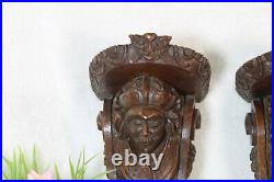 PAIR antique wood carved portrait head Wall console