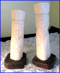 Pair Carved Man and Woman Figure Pendant African on wood stands