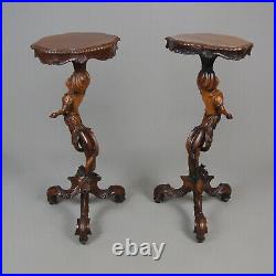 Pair of 19th Century Black Forest Carved Walnut Torcheres c. 1860
