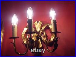 Pair of Hand Carved and Gilded Italian/Florentine bow sconces