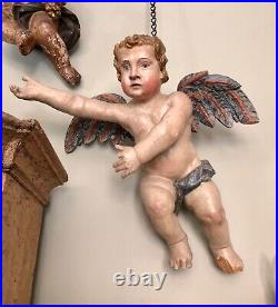 Pair of large antique wooden carved polychrome cherub putti angel figure