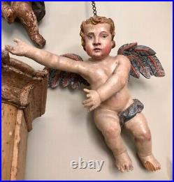 Pair of large antique wooden carved polychrome cherub putti angel figure